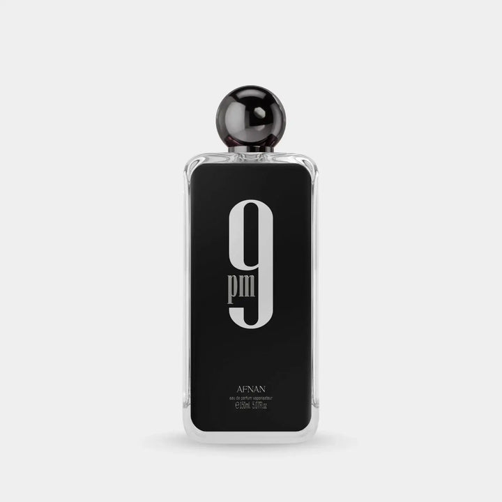 9 PM fragrance bottle showcasing bold design and masculine scent.
